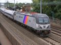 acs-64 in NJ Transit disco stripe